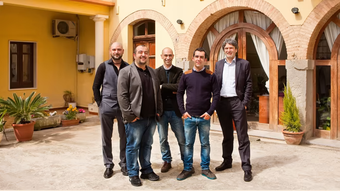 Sardex’s founders outside their office in Serramanna, Sardinia Sardex’s founders outside their office in Serramanna, Sardinia © Alessandro Toscano